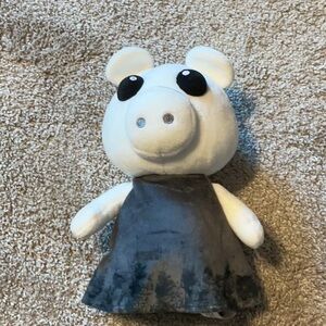 White and Black Plush Toy